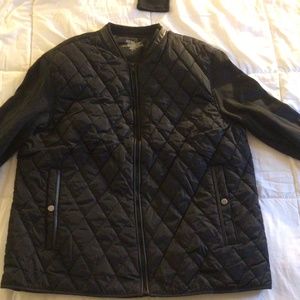 womans jacket large NWT. New with tags….snap pockets, front sipper,,,